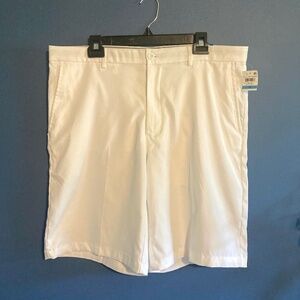 Greg Norman white golf shorts